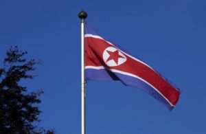 File photo of North Korean flag flying on a mast at the Permanent Mission of North Korea in Geneva